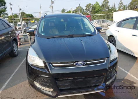 2015 Ford Escape Titanium z USA, uszkodzony, nr VIN 1FMCU0JX9FUB03122